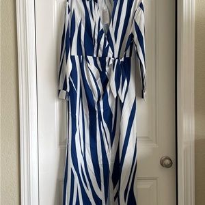 New never worn blue and white silky faux wrap dress, size medium.
